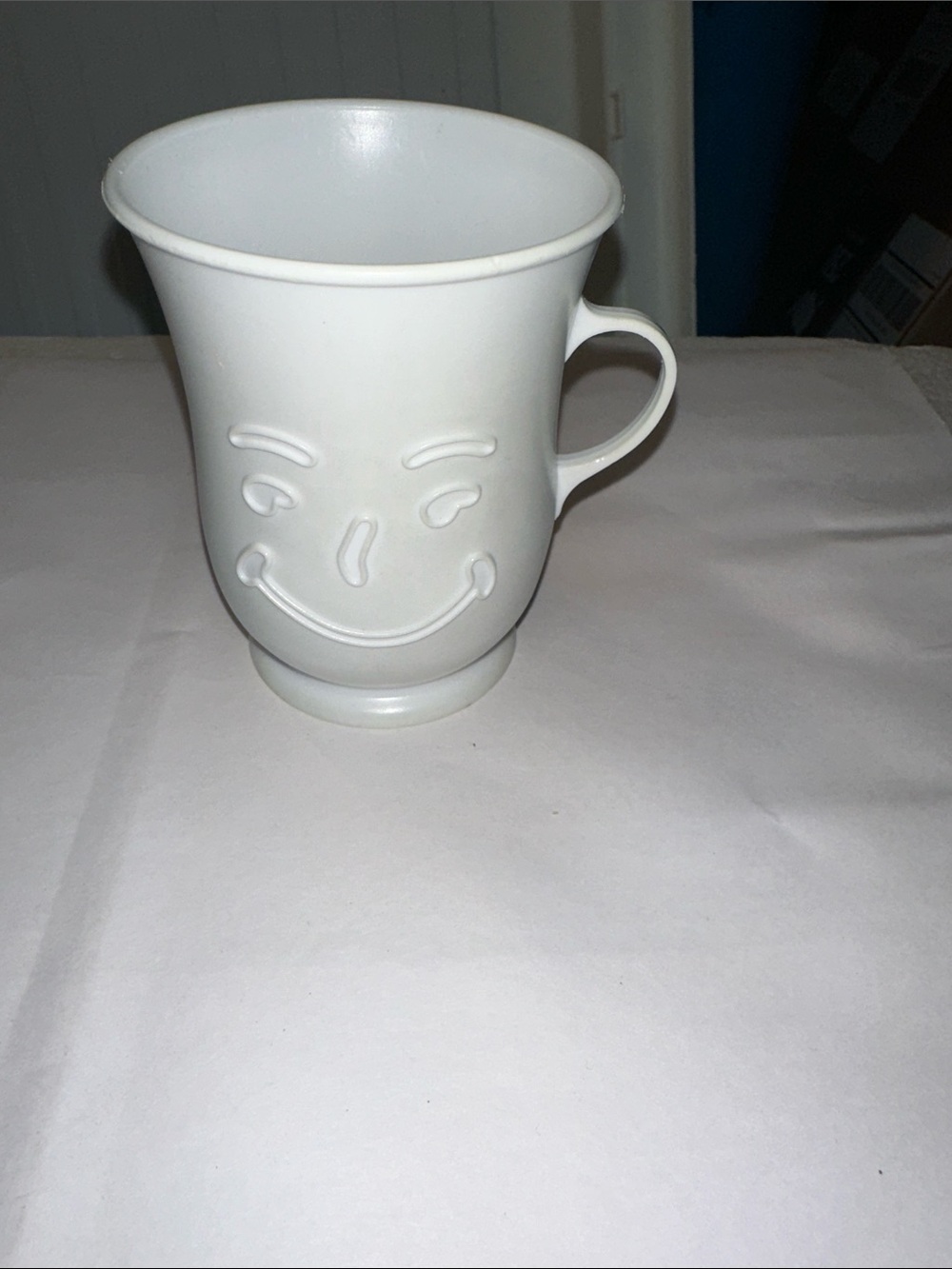Vintage and rare Kool-Aid Man Smiling plastic cup with handle